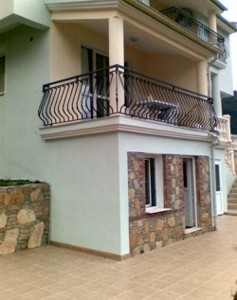 Lower sun terrace area and appartment with views over the valley towards the coast and Fethiye Lower sun terrace area and appartment with views over the valley towards the coast and Fethiye